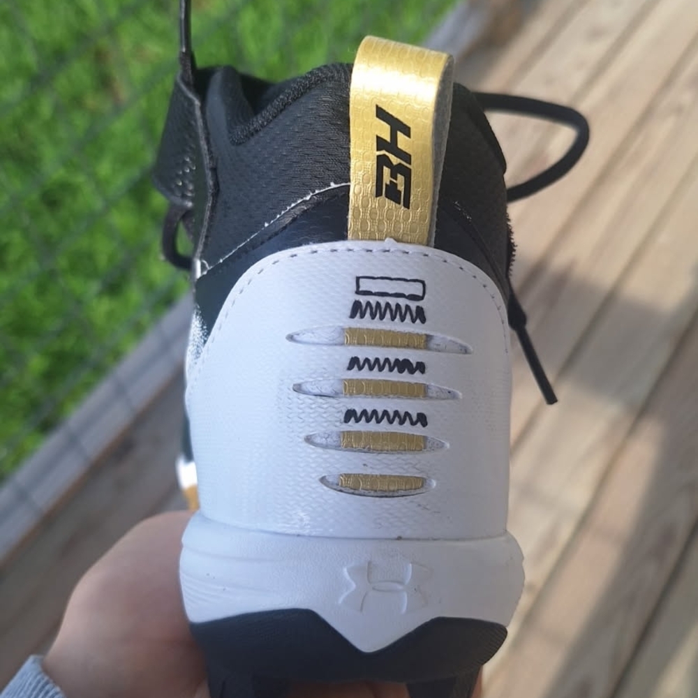 Under Armour Black and White Sneakers with Modern Design